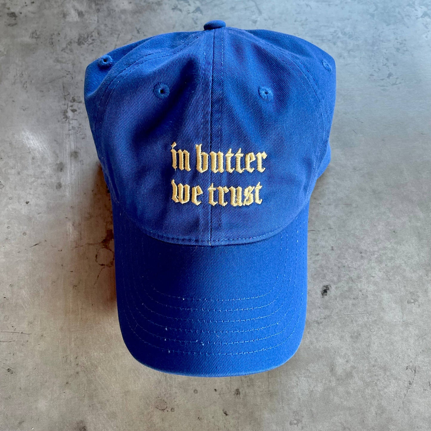 In butter we trust Baseball Cap