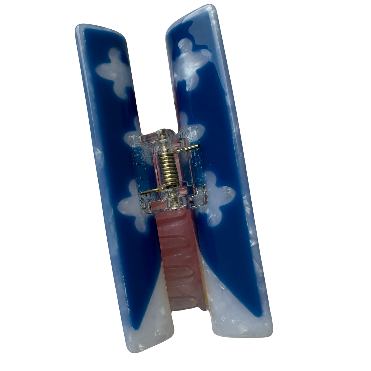 The top of the acadiana flag hair claw, showing the spring mechanism