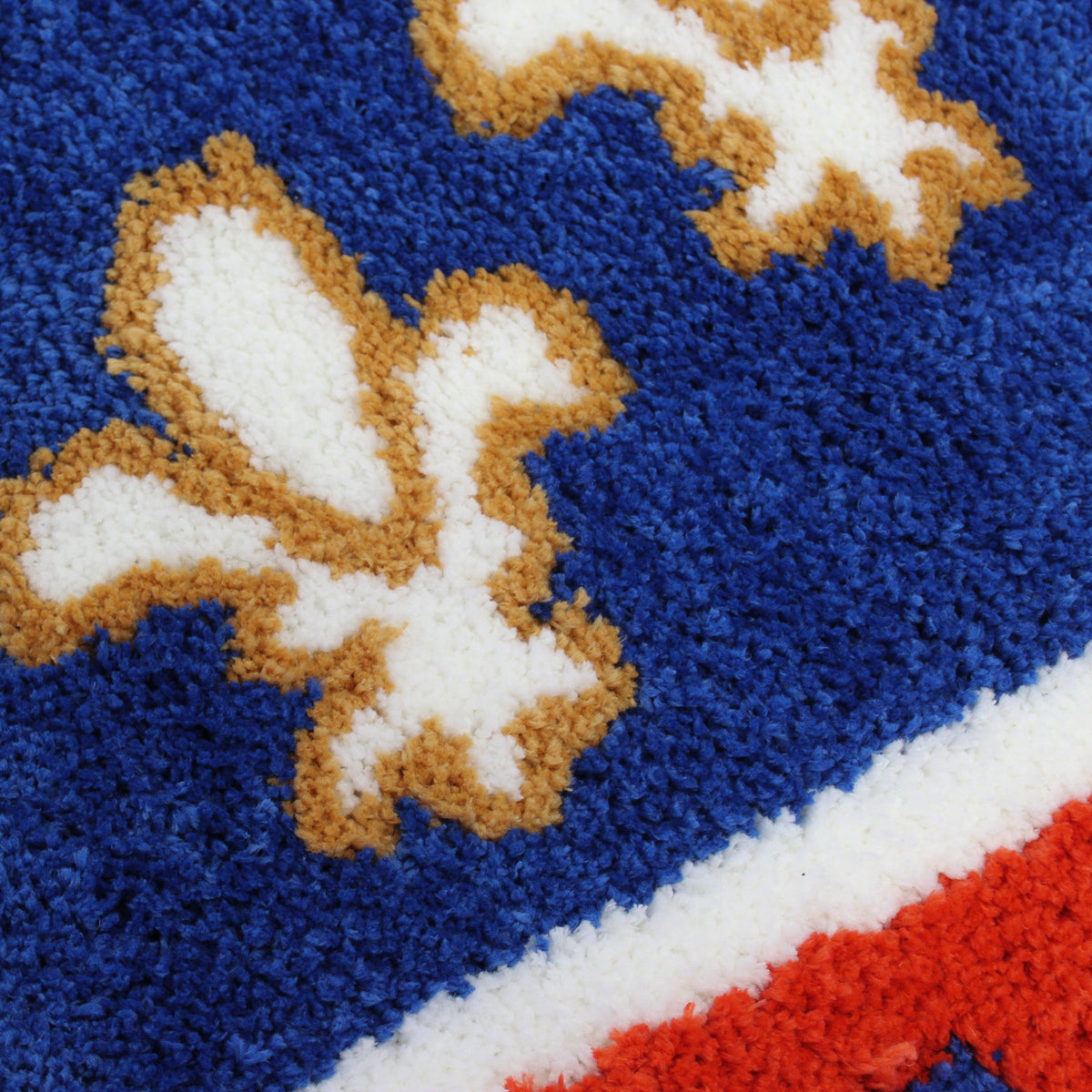 close up on the blue portion of the acadiana flag rug
