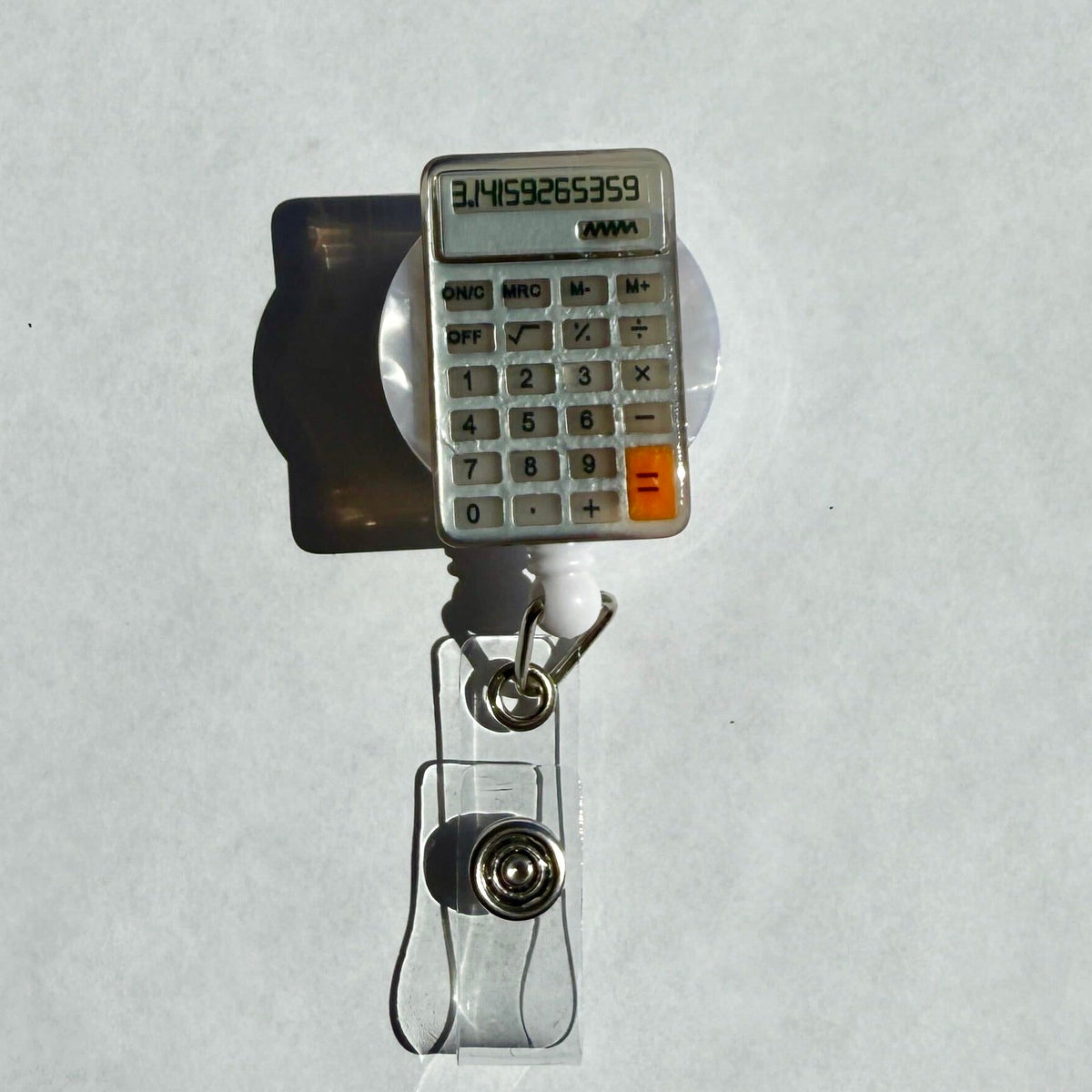 Calculator Badge Reel