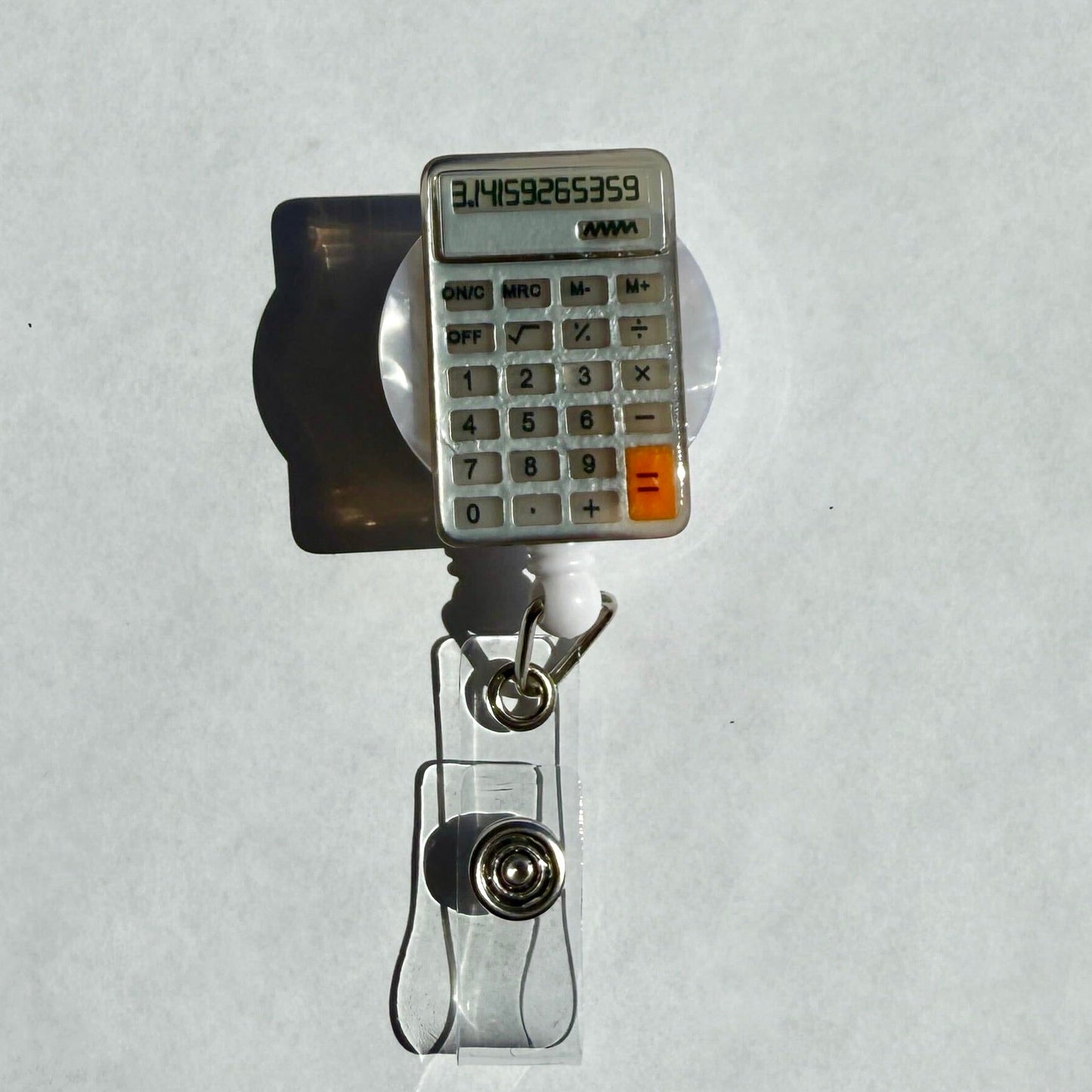 Calculator Badge Reel