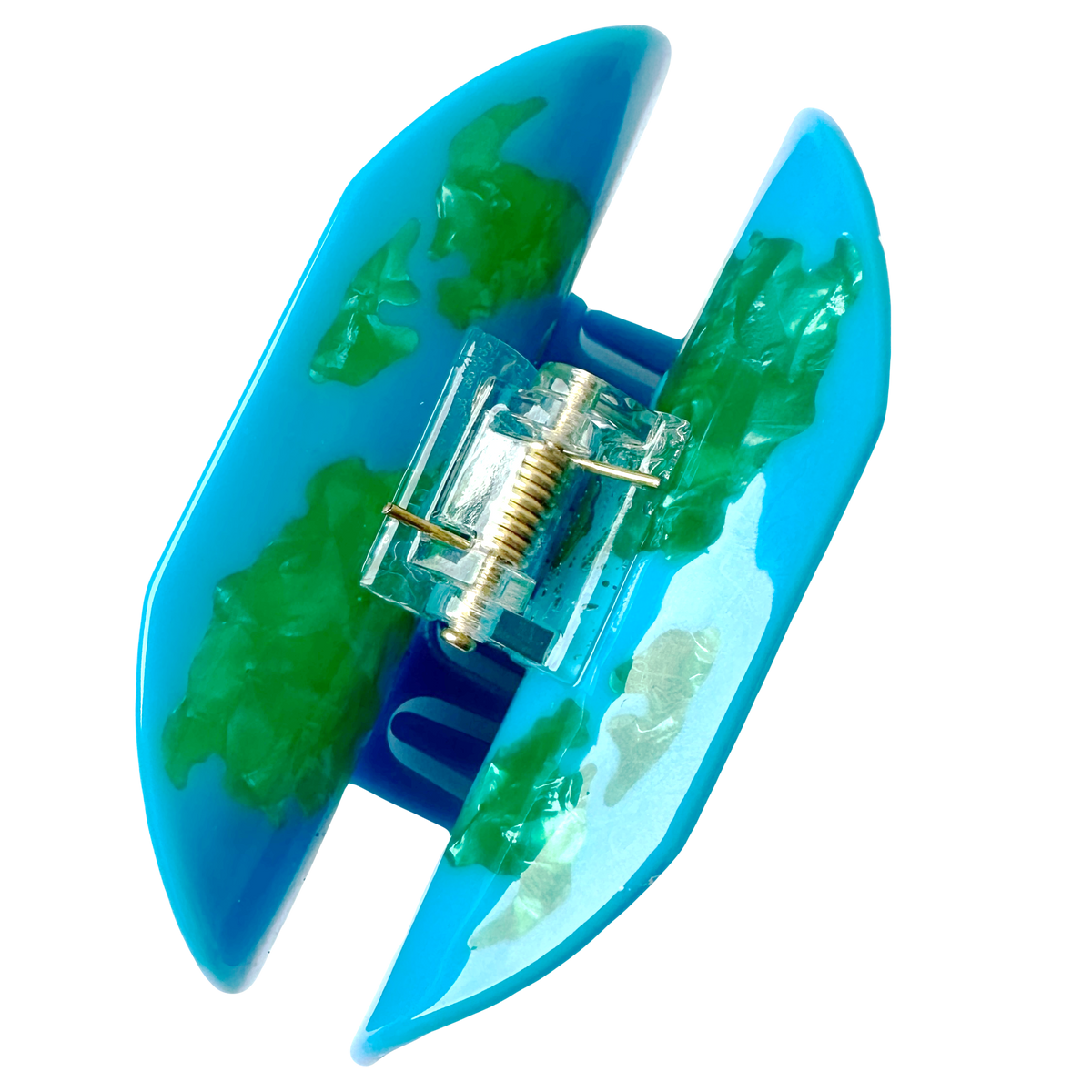 The World Map Hair Claw from above, showing the gold spring mechanism between the two blue and green marbled halves of the claw.