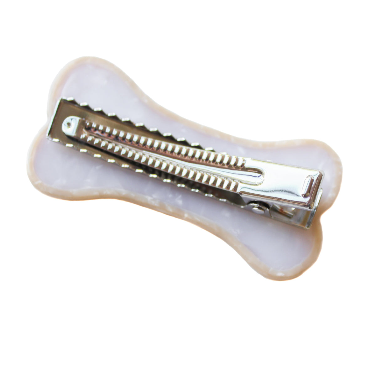 the back of the bone hair clip, showing the alligator clip mechanism