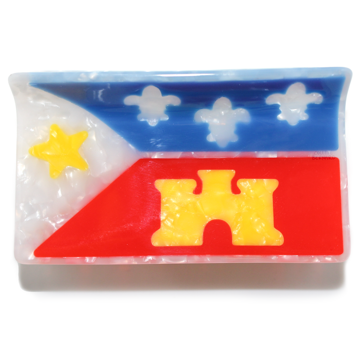 The Acadiana Flag hair claw on a white background
