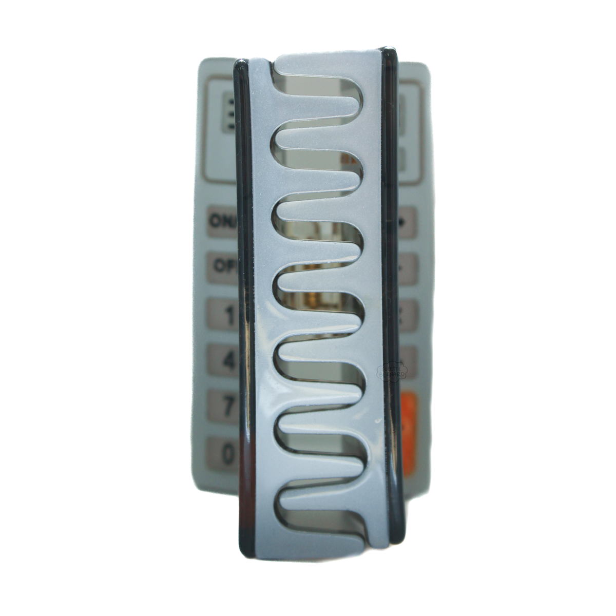 The teeth of the calculator hair claw, which are the same silver as the claw